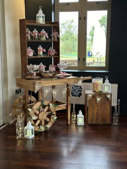 Rustic wooden sweet cart hire with sweet jars in Essex